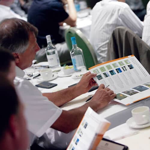 A delegate reading a brochure at a Tensar-led CPD seminar 